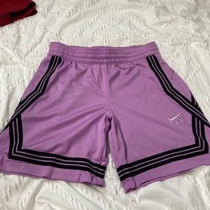 girls purple nike fly basketball shorts